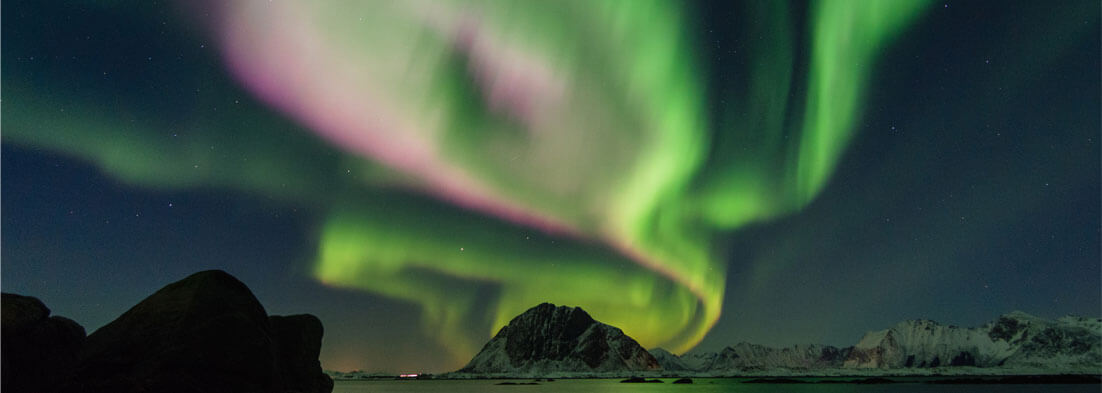 5 reasons junior science is essential banner image of aurora over mountains