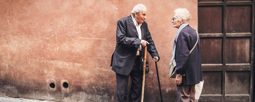 photo of cute old people having a conversation