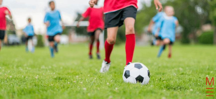 Year 6 student playing soccer