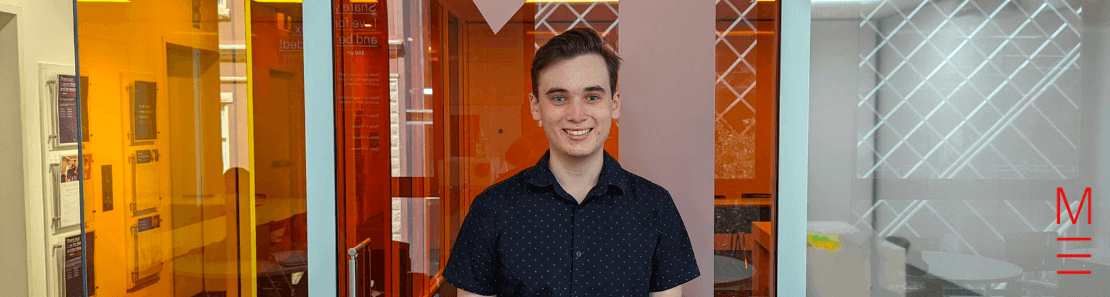 matrix education student Adam heatshot smiling at the camera for his blog article on how to be more efficient.