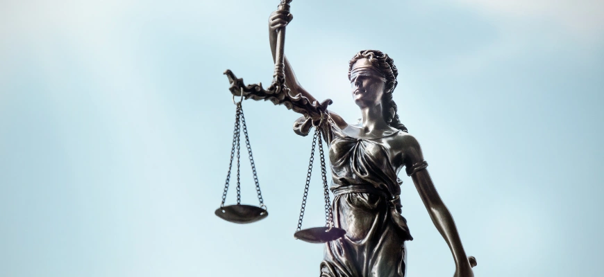 matrix education A statue of Lady Justice holding scales