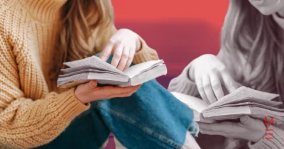 Students analysing a book, focusing on understanding literary techniques.