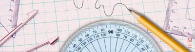 matrix education Graph paper with a pencil, protractor, and rulers for maths work