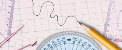 matrix education Graph paper with a pencil, protractor, and rulers for maths work